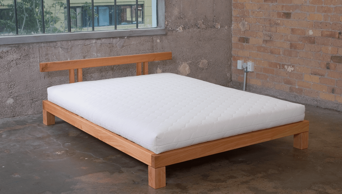 New Zealand made solid wood bed frame with organic latex mattress